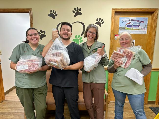 Albion Animal Center staff Hog Meat from 4-H sale